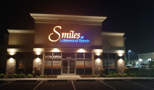 Smiles At Lakewood Ranch Building At Night